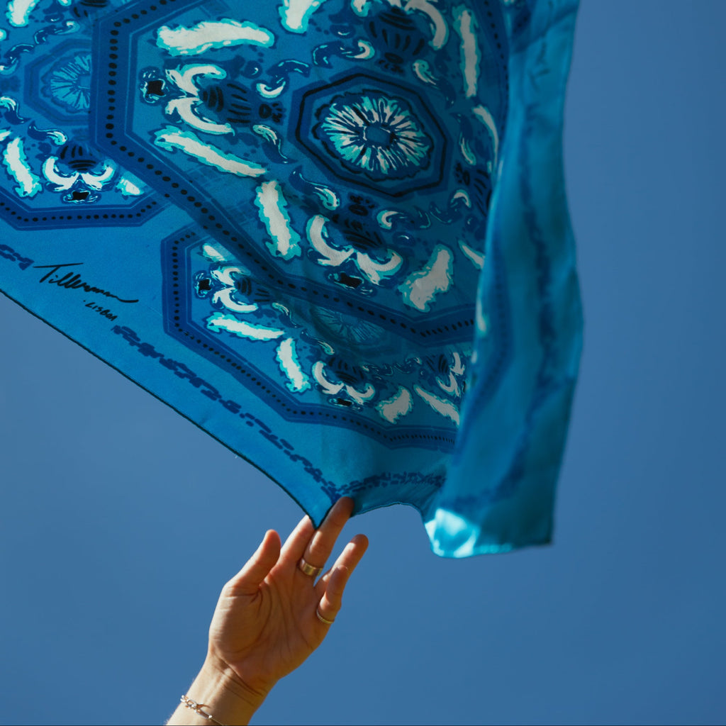 Senhora do monte foulard in blue by tillerman is thrown in the air flowing in the wind